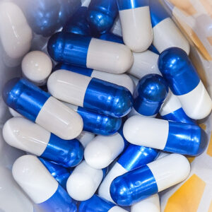 Drops of Olympus 45mg MIT Extract Capsules